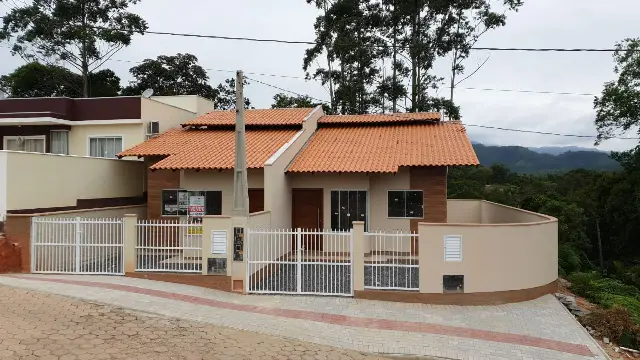 Casa com três quartos